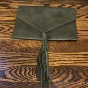 Anthropologie Street Level faux pebbled leather olive tasseled envelope clutch.